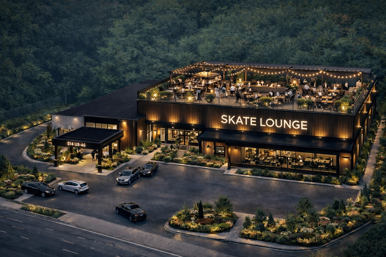 Aerial night view of The Skate Lounge exterior at 514 US-46 with rooftop lounge